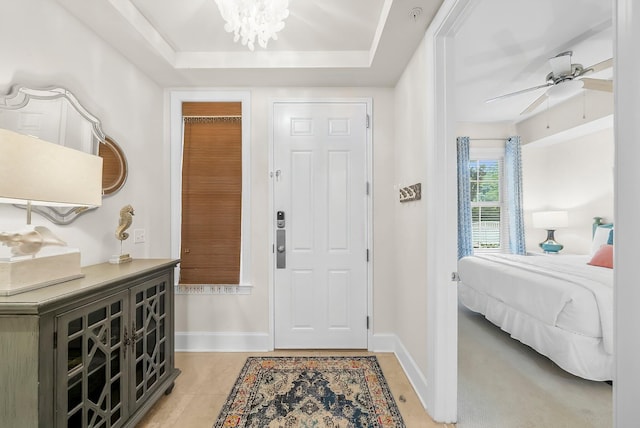 1653 W County Highway 30a Unit 1109, Santa Rosa Beach, FL 32459 - entrance foyer featuring baseboards, a ceiling fan, a chandelier, and light tile patterned floors
