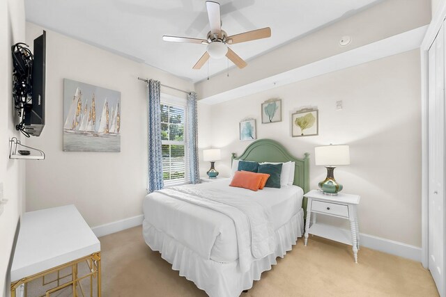 1653 W County Highway 30a Unit 1109, Santa Rosa Beach, FL 32459 - bedroom with baseboards, light colored carpet, and ceiling fan