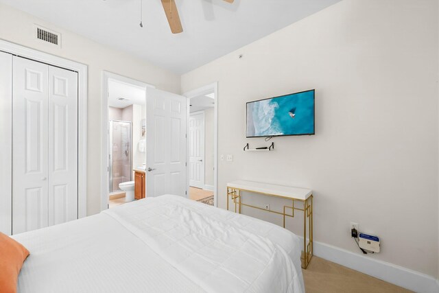 1653 W County Highway 30a Unit 1109, Santa Rosa Beach, FL 32459 - bedroom featuring baseboards, a closet, light colored carpet, connected bathroom, and ceiling fan