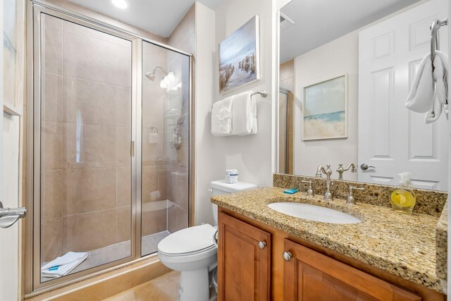 1653 W County Highway 30a Unit 1109, Santa Rosa Beach, FL 32459 - bathroom with a shower stall, toilet, and vanity