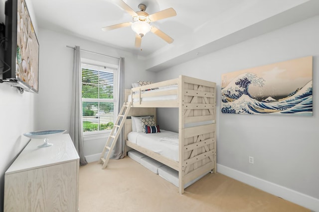 1653 W County Highway 30a Unit 1109, Santa Rosa Beach, FL 32459 - bedroom with baseboards, light carpet, and ceiling fan