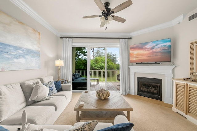1653 W County Highway 30a Unit 1109, Santa Rosa Beach, FL 32459 - living room with crown molding, light colored carpet, ceiling fan, and a glass covered fireplace