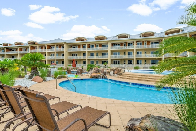 1653 W County Highway 30a Unit 1109, Santa Rosa Beach, FL 32459 - community pool featuring a patio area