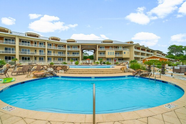 1653 W County Highway 30a Unit 1109, Santa Rosa Beach, FL 32459 - community pool with a patio area