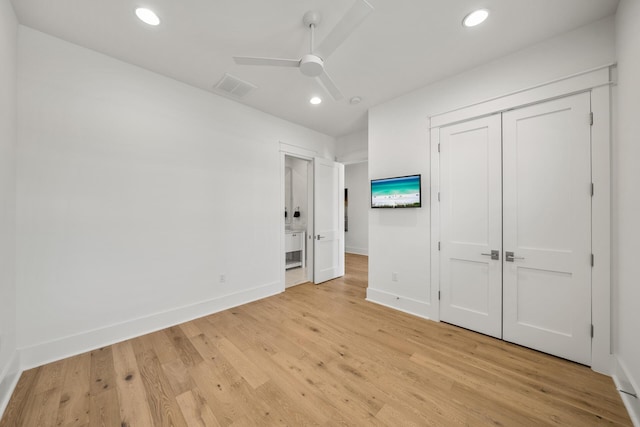 unfurnished bedroom featuring baseboards, light wood-style floors, recessed lighting, connected bathroom, and ceiling fan