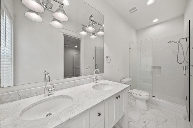 full bath featuring a shower stall, toilet, double vanity, recessed lighting, and marble finish floors
