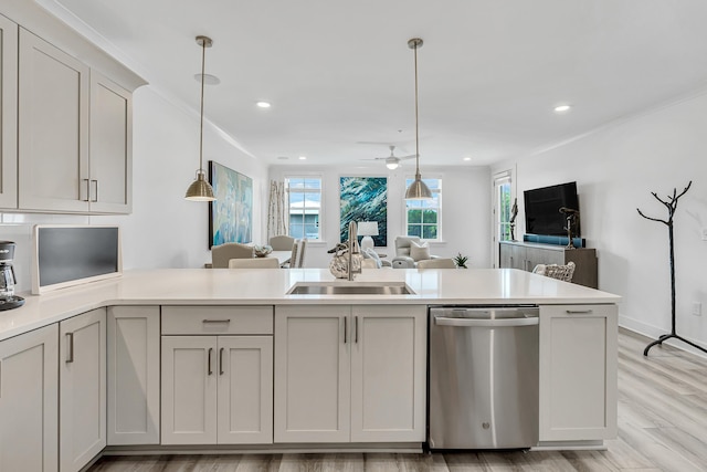179 S County Highway 393 Unit 445, Santa Rosa Beach, FL 32459 - kitchen featuring dishwasher, a sink, open floor plan, a peninsula, and decorative light fixtures