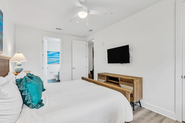 179 S County Highway 393 Unit 445, Santa Rosa Beach, FL 32459 - bedroom with baseboards, wood finished floors, ensuite bathroom, and ceiling fan