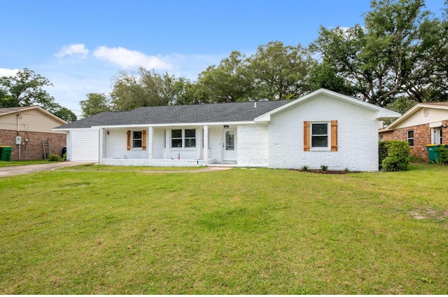 1411 28th St, Niceville, FL 32578 - single story home with a front lawn and brick siding