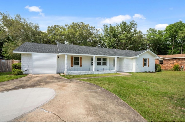 1411 28th St, Niceville, FL 32578 - single story home with brick siding and driveway