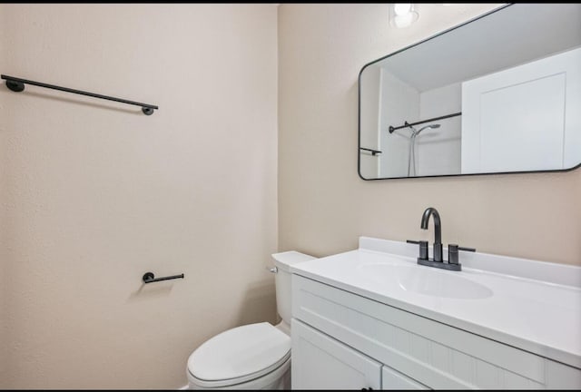 1411 28th St, Niceville, FL 32578 - bathroom with toilet and vanity