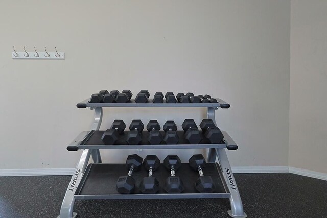 2606 Scenic Gulf Dr Unit 4108, Miramar Beach, FL 32550 - workout room with baseboards
