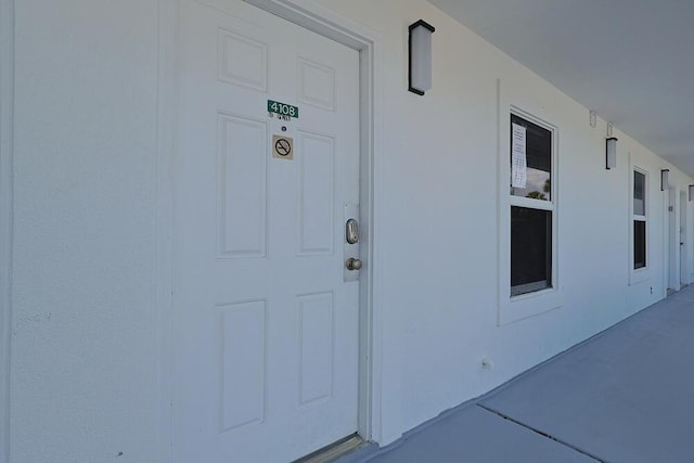 2606 Scenic Gulf Dr Unit 4108, Miramar Beach, FL 32550 - view of exterior entry featuring stucco siding