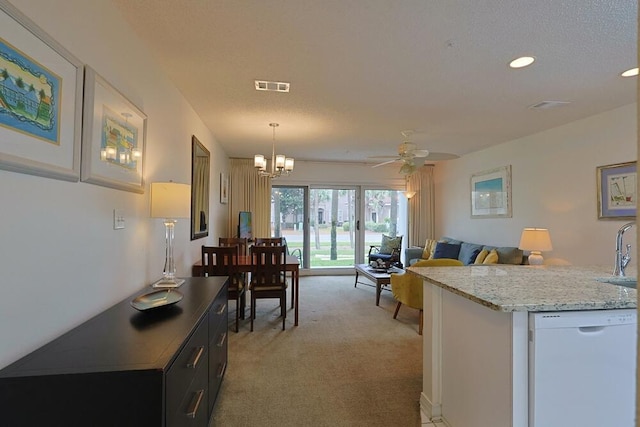 2606 Scenic Gulf Dr Unit 4108, Miramar Beach, FL 32550 - kitchen featuring white dishwasher, light carpet, a sink, open floor plan, and ceiling fan