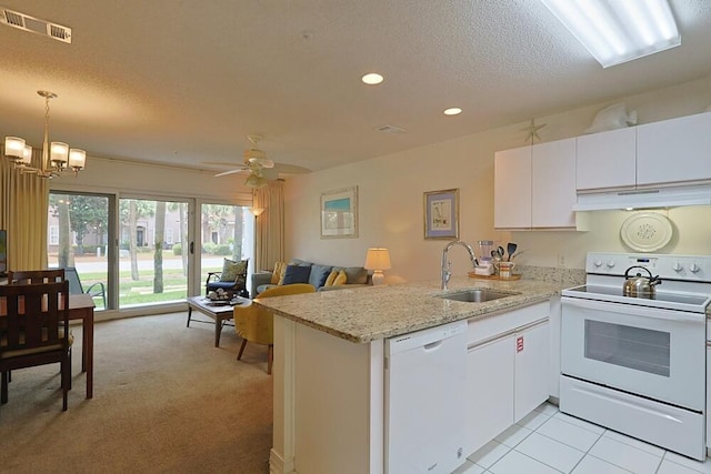 2606 Scenic Gulf Dr Unit 4108, Miramar Beach, FL 32550 - kitchen with white appliances, under cabinet range hood, a sink, a peninsula, and open floor plan