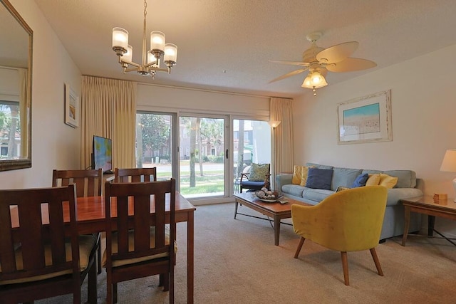 2606 Scenic Gulf Dr Unit 4108, Miramar Beach, FL 32550 - dining area with carpet floors, a chandelier, and a ceiling fan