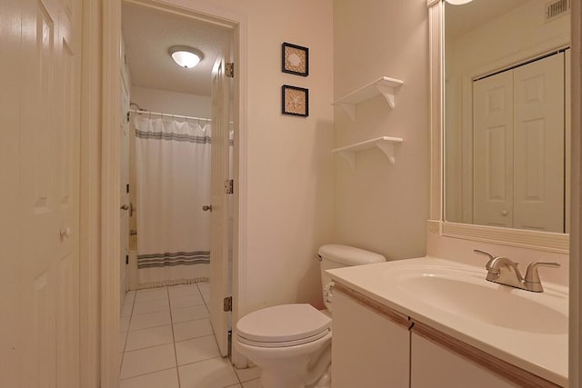 2606 Scenic Gulf Dr Unit 4108, Miramar Beach, FL 32550 - bathroom with toilet, tile patterned flooring, and vanity