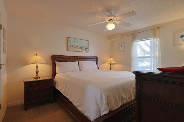2606 Scenic Gulf Dr Unit 4108, Miramar Beach, FL 32550 - carpeted bedroom featuring a ceiling fan and a textured ceiling