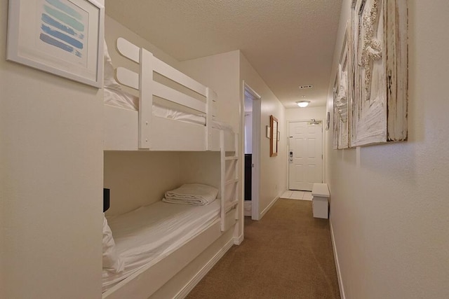 2606 Scenic Gulf Dr Unit 4108, Miramar Beach, FL 32550 - carpeted bedroom featuring baseboards and a textured ceiling