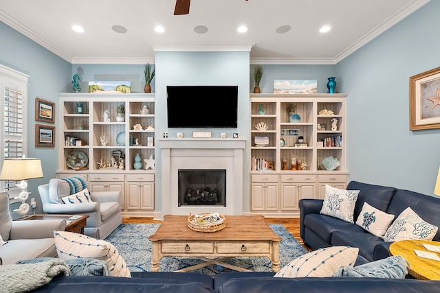 728 Breakers St, Watersound, FL 32461 - living room featuring light wood finished floors, a fireplace, ornamental molding, a ceiling fan, and recessed lighting