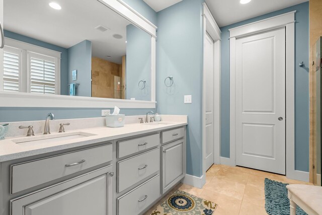 728 Breakers St, Watersound, FL 32461 - full bath featuring double vanity, tile patterned flooring, baseboards, tiled shower, and recessed lighting