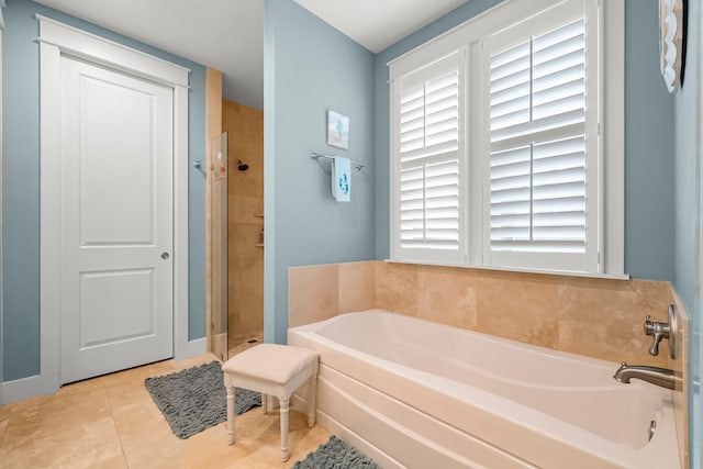 728 Breakers St, Watersound, FL 32461 - full bath featuring a garden tub, tile patterned flooring, and a shower stall
