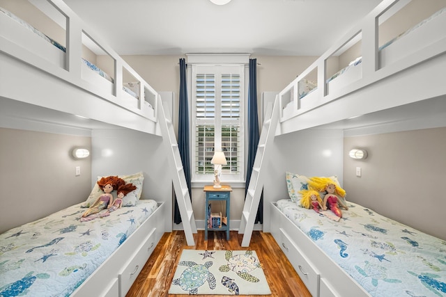 728 Breakers St, Watersound, FL 32461 - bedroom with wood finished floors and baseboards
