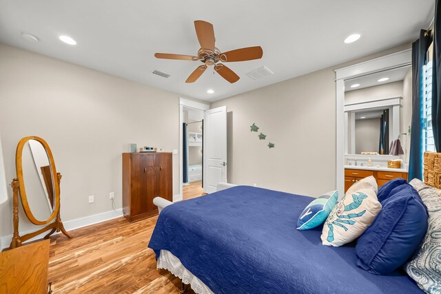 728 Breakers St, Watersound, FL 32461 - bedroom with light wood-style flooring, ceiling fan, ensuite bath, recessed lighting, and baseboards