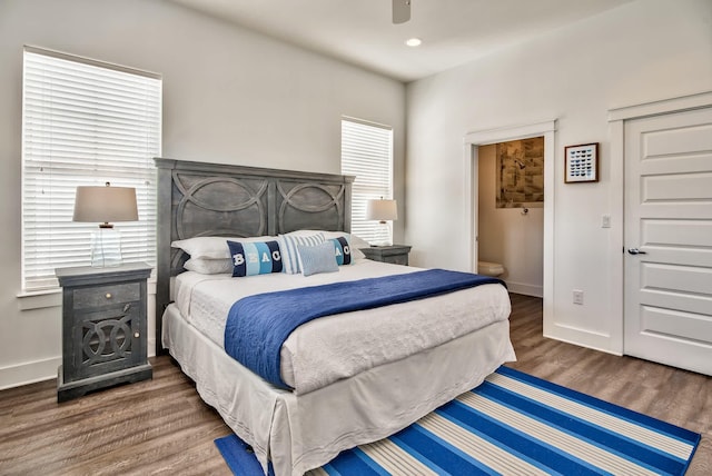 246 Driftwood Rd, Miramar Beach, FL 32550 - bedroom with wood finished floors, multiple windows, baseboards, a ceiling fan, and recessed lighting