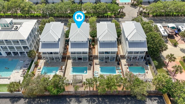 246 Driftwood Rd, Miramar Beach, FL 32550 - aerial perspective of suburban area featuring a pool area