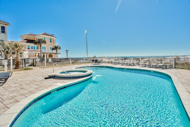 134 Norwood Dr Ph 3, Miramar Beach, FL 32550 - community pool featuring a hot tub, fence, and a patio