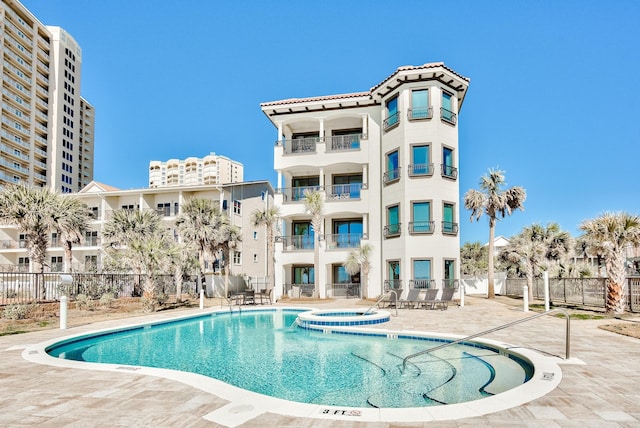 134 Norwood Dr Ph 3, Miramar Beach, FL 32550 - view of pool with fence and a pool with connected hot tub