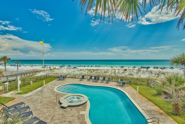 134 Norwood Dr Ph 3, Miramar Beach, FL 32550 - community pool featuring fence, view of water and beach, and a patio