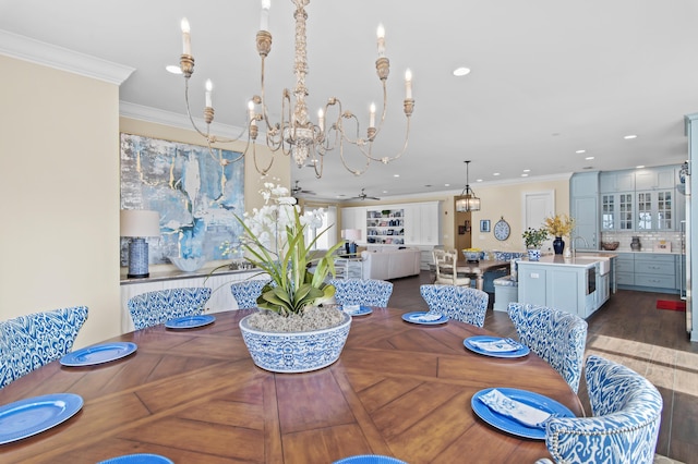134 Norwood Dr Ph 3, Miramar Beach, FL 32550 - dining space featuring a chandelier, crown molding, recessed lighting, and wood finished floors
