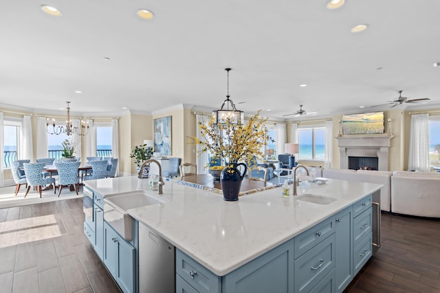 134 Norwood Dr Ph 3, Miramar Beach, FL 32550 - kitchen featuring a chandelier, a sink, open floor plan, a center island with sink, and recessed lighting