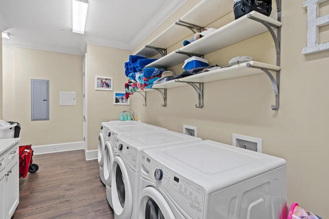 134 Norwood Dr Ph 3, Miramar Beach, FL 32550 - washroom with independent washer and dryer, electric panel, ornamental molding, dark wood finished floors, and baseboards