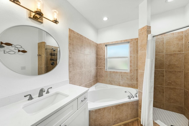 216 E Park Place Ave, Inlet Beach, FL 32461 - full bathroom featuring a garden tub, a tile shower, vanity, and recessed lighting