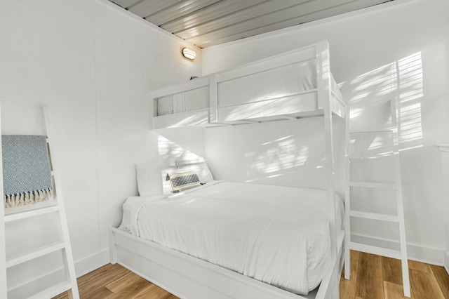 216 E Park Place Ave, Inlet Beach, FL 32461 - bedroom featuring wood finished floors