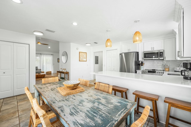 216 E Park Place Ave, Inlet Beach, FL 32461 - dining area featuring recessed lighting, light tile patterned floors, a ceiling fan, and electric panel