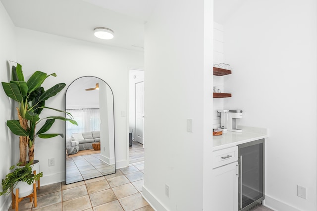 216 E Park Place Ave, Inlet Beach, FL 32461 - bar with wine cooler, baseboards, and light tile patterned floors