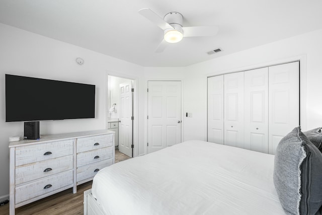 216 E Park Place Ave, Inlet Beach, FL 32461 - bedroom featuring a closet, wood finished floors, a ceiling fan, and ensuite bath