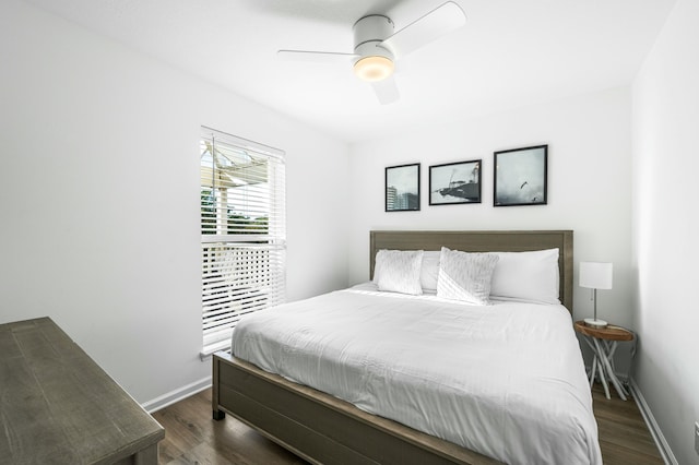 216 E Park Place Ave, Inlet Beach, FL 32461 - bedroom with dark wood finished floors, baseboards, and a ceiling fan