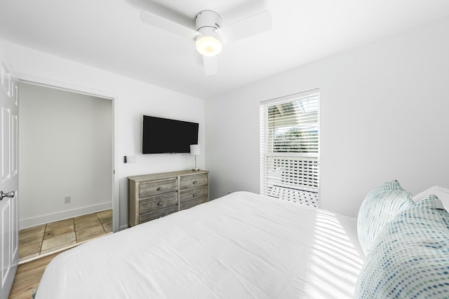 216 E Park Place Ave, Inlet Beach, FL 32461 - bedroom featuring a ceiling fan and baseboards