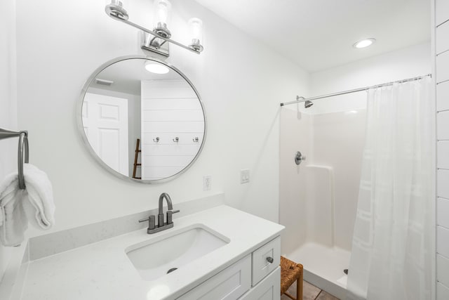 216 E Park Place Ave, Inlet Beach, FL 32461 - bathroom with a shower stall, vanity, tile patterned flooring, and recessed lighting