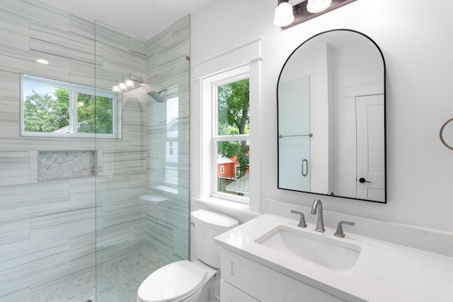 180 Rearden Way, Santa Rosa Beach, FL 32459 - bathroom with healthy amount of natural light, a shower stall, toilet, and vanity