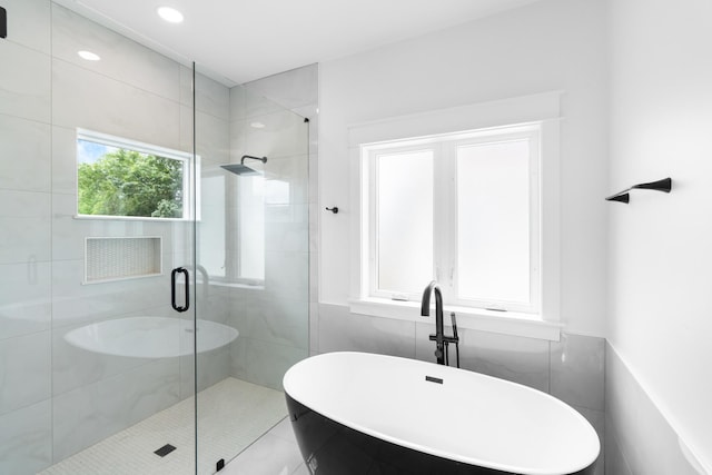 180 Rearden Way, Santa Rosa Beach, FL 32459 - bathroom featuring a stall shower and a freestanding bath