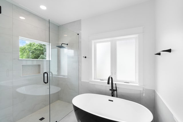 180 Rearden Way, Santa Rosa Beach, FL 32459 - bathroom with a soaking tub and a stall shower