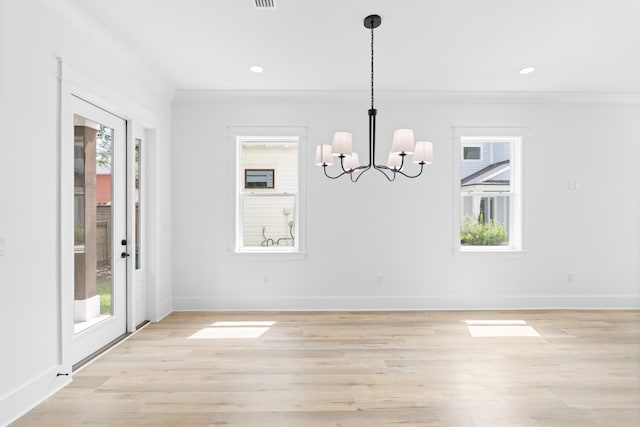 180 Rearden Way, Santa Rosa Beach, FL 32459 - unfurnished dining area with a chandelier, light wood-style floors, baseboards, recessed lighting, and ornamental molding