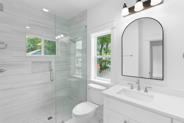 180 Rearden Way, Santa Rosa Beach, FL 32459 - bathroom featuring plenty of natural light, toilet, and a stall shower