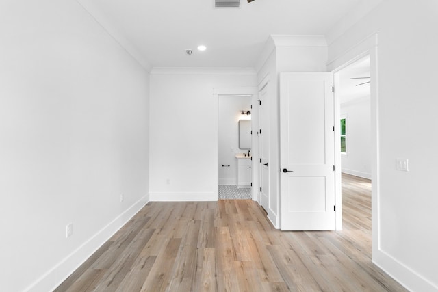 180 Rearden Way, Santa Rosa Beach, FL 32459 - unfurnished bedroom featuring light wood finished floors, ornamental molding, baseboards, and ensuite bathroom
